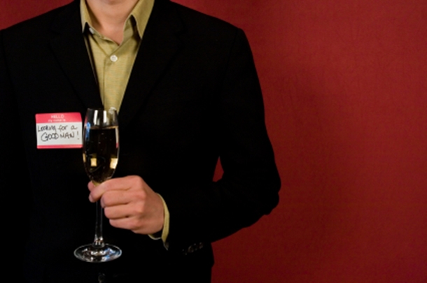Man with Wine and Name Tag