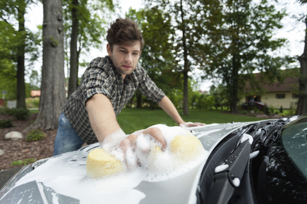 Sexy Guy Washing Car